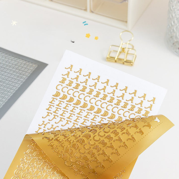 Gold and Silver Foil Letter Stickers Close-up Image for Scrapbooking